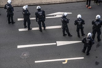 Police officers, police task force, on duty at the demonstration against the AFD party conference