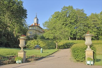 Baroque tea palace and lidded vases in the palace park, pleasure palace, English garden, building,