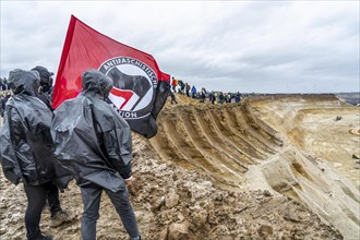 Many thousands of demonstrators march after a demonstration against the demolition of the lignite