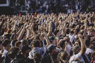 Fans react during the European Championship preliminary round match between Germany and Hungary on