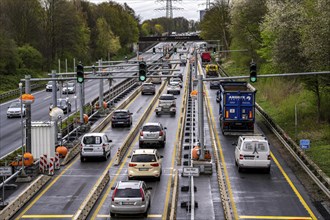 Weighing and barrier system on the A42 motorway, in front of the dilapidated motorway bridge over