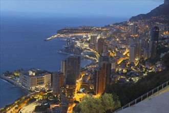 Monte Carlo panorama illuminated by night. Urban landscape with luxury architecture