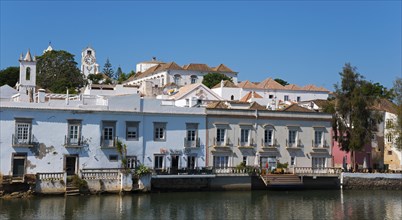 Waterfront promenade with historic buildings, Gilão River, Gilao, Tavira, Faro, Algarve, Portugal,