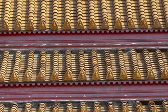 Roof decoration at the Uposatha Hall, Ubosot, the roof is staggered in three tiers and covered with