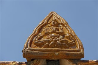 Roof decoration at the Uposatha Hall, Ubosot, the roof is staggered in three tiers and covered with