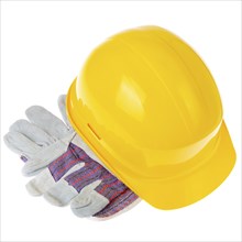 Yellow plastic hard hat and protective gloves isolated on white background. Safe labor concept