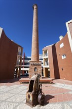 Chimney of industry in Portimao, Algarve, Portugal, Europe