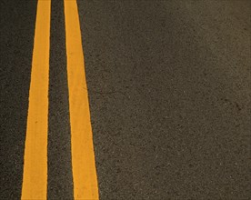 Double Yellow Marking Lines On A Road With Copy Space