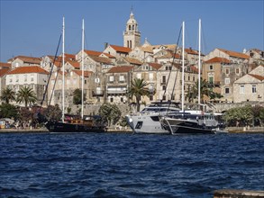 Boats anchored off Korcula, Korcula harbour, Korcula island, Dalmatia, Croatia, Europe