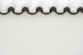 Winter Seasonal Image Of Thick Snow On Some Roof Tiles With Copy Space