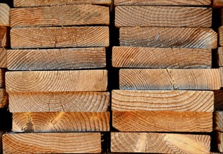 Background Texture Of A Stack Of Timber Planks For The Construction Industry