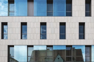 Ingolstadt, Bavaria, Germany, 07 27 2018: Rectangular facade with glass and cocnrete of an office