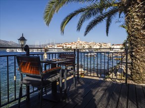 Set restaurant table, Korcula harbour, Korcula island, Dalmatia, Croatia, Europe