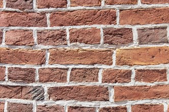 Closeup of a red bricks old wall