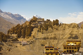 A stunning view of the Himalaya mountains behind the old and new monastery of Dhankar, Spiti