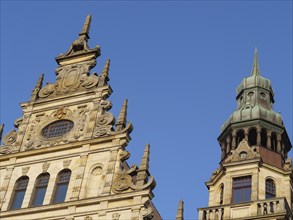 Decorated towers of historic buildings under a blue sky, Bremen, Germany, Europe