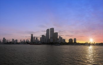 Colombia, scenic Cartagena bay Bocagrande and panorama of city skyline at sunset, South America