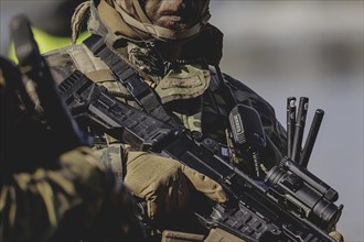 A soldier with a rifle, taken during the military exercise 'Wettiner Schwert' with German and Czech