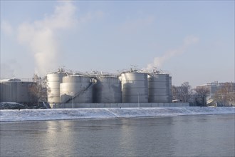 BASF plant site on the banks of the Rhine, chemical company, tank farm, foggy mood, snow,