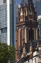 Tower of the Dreikönigskirche in front of the skyscrapers of the banking district, Frankfurt am