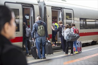 May 22, 2024: Passengers board an ICE train at Mannheim main station Germany