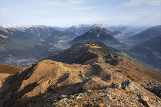 Venet mountain ridge at Kreuzjoch summit, view of Tschirgant summit and the Oberinntal valley, in