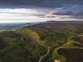 Sunset over Cod Beck Reservoir from a drone, North York Moors National Park, North Yorkshire,