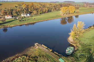 Aerial view over river Elbe, at village Kleinzadel north of city Meissen, little ferry, Germany,