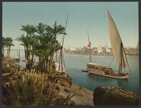 Egypt. Cairo. On the Nile shore near Boulac, with Dahableh making sail, Egypt, Historic, digitally