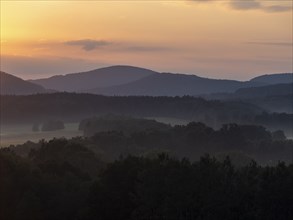 Mountain landscape in evening mood, meadows, forests and fog, Lusatian Mountains, Bohemia, Czech