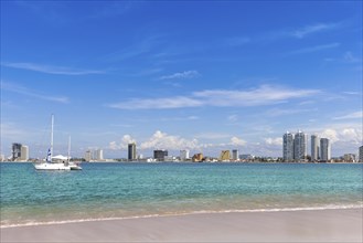 View from Deer Island, Isla de Venados, of famous Mazatlan sea promenade El Malecon, with ocean