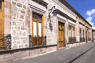 Morelia, Michoacan, colorful streets and colonial houses in Morelia historic city center, one of