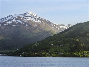 Mountains and Fjord over Norwegian Village, Olden, Innvikfjorden, Norway, Europe