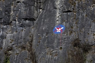 Steep rock face made of mass limestone with painting, Hönnetal, Balve, Sauerland, North