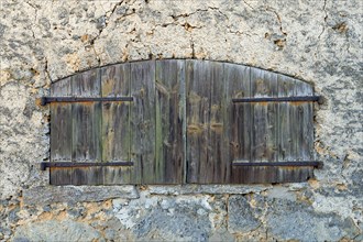 Old, closed, wooden shop at an old barn, Höfles. Upper Franconia, Bavaria Germany