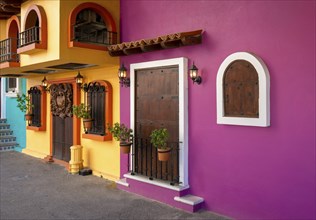 Restaurants and cafes with ocean views on Playa De Los Muertos beach and pier close to famous