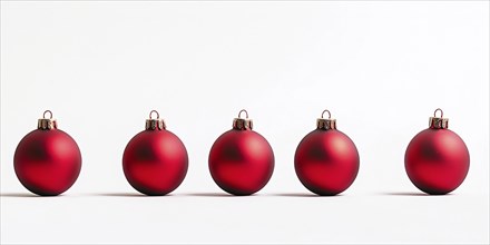 Red Christmas tree bauble ornaments in a row on white background. Generative AI, AI generated