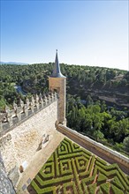 Tower and garden in the Alcázar or castle of Segovia, province of Segovia, Castile and Leon, Spain,