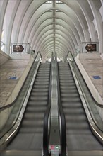 Liège-Guillemins railway station, architect Santiago Calatrava, escalator in motion with curved