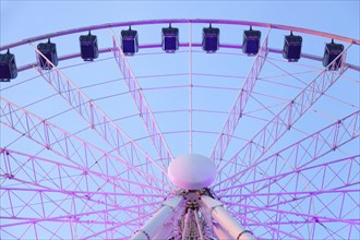 Rhine promenade with illuminated Ferris wheel at dusk, Dusseldorf, North Rhine-Westphalia, Germany,