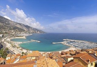 Scenic panoramic view of Menton seashore promenade and historic city in French Riviera Cote D azur