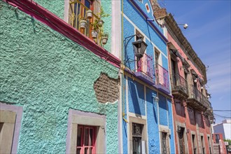 Scenic cobbled streets and traditional colorful colonial architecture in Guanajuato historic city