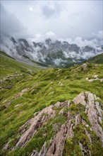 Cloudy rocky mountain peaks Wolayer Köpf and Biegenköpfe, Carnic Alps, Carnic High Trail,