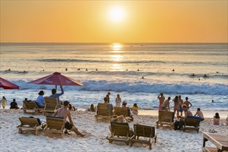 Surfers and bathers, beach, holiday, sunset, travel, beach holiday, tourism, evening sun, evening