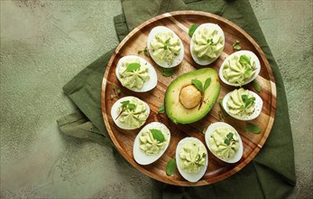 Snack, stuffed eggs with avocado, homemade, no people