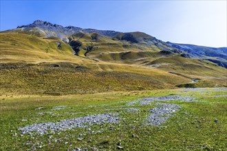 View of road and mountains at border pass Col de Larche (Colle della Maddelena), Provinz Cuneo,