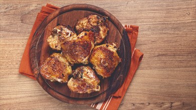 Fried chicken thighs, with spices, homemade, no people