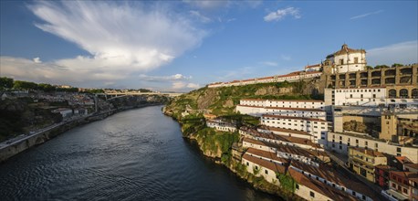 Panorama of Vila Nova de Gaia city with Mosteiro da Serra do Pilar monastery and Douro river on