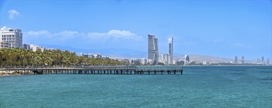 Cyprus, Limassol, Molos seafront promenade and scenic views of Olimpia coast and financial center,