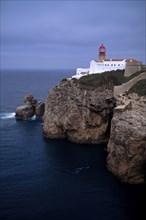 Lighthouse Farol do Cabo de São Vicente, Cape St. Vincent, Sagres, steep coast, Atlantic Ocean,